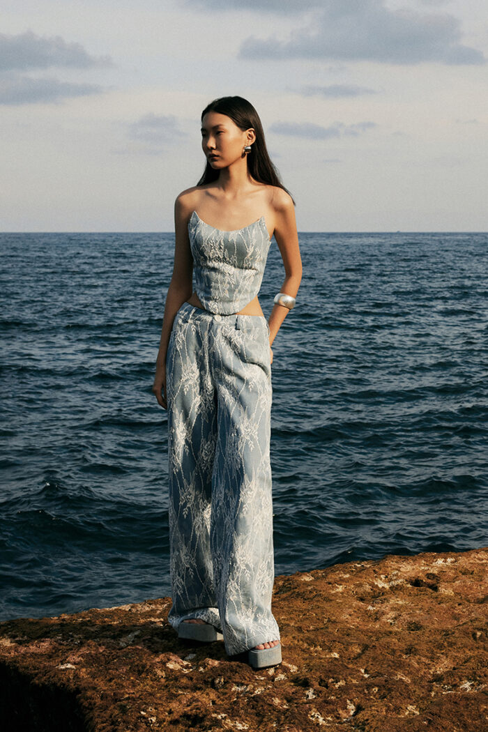 Phil Mid-Rise Wide-Leg Jeans - Image 1